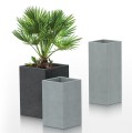 Wysokie prostokątne doniczki słupki jak z betonu architektonicznego C-Cube.jpg