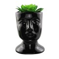 czarne-doniczki-ceramiczne-w-ksztalcie-glowy.jpg