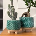 turkusowe-oslonki-na-doniczki-na-nozkach.jpg